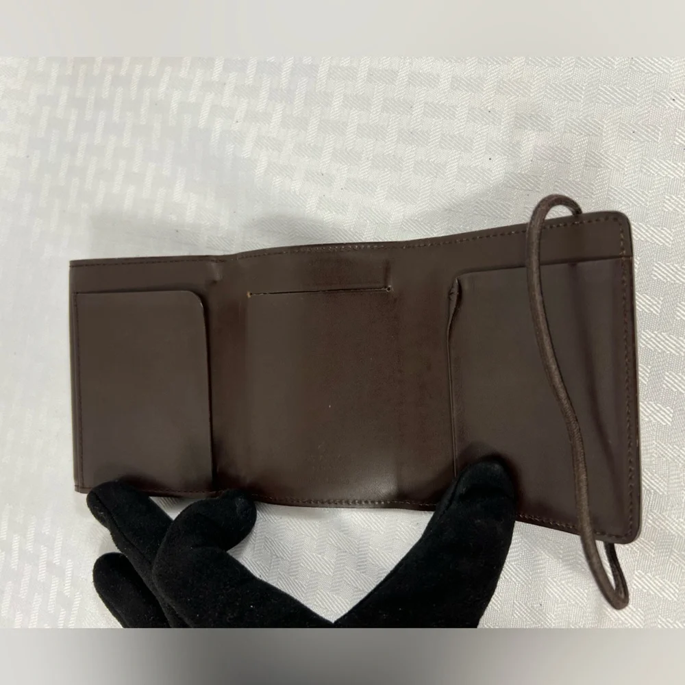 1083: Louis Vuitton Vintage Brown Epi Leather Compact Wallet
